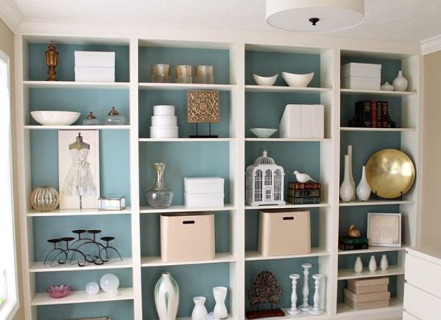 Painting the bookcase's back-panel might be a great way to add a color splash to your room.