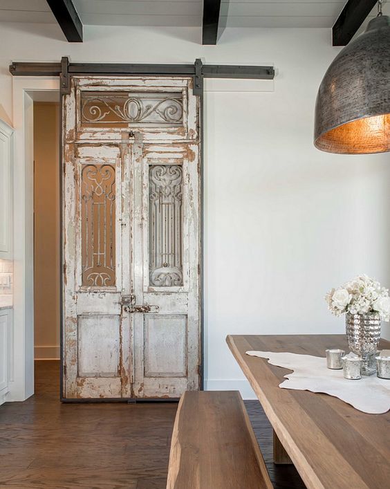 a refined vintage sliding door for an exquisite feel in the space