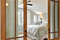 wood and glass sliding doors in a light shade for a rustic and cozy touch