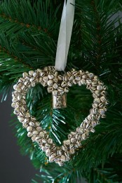 a heart ornament of silver bells is a very cool and cute decor idea to rock and you can make as many as you want