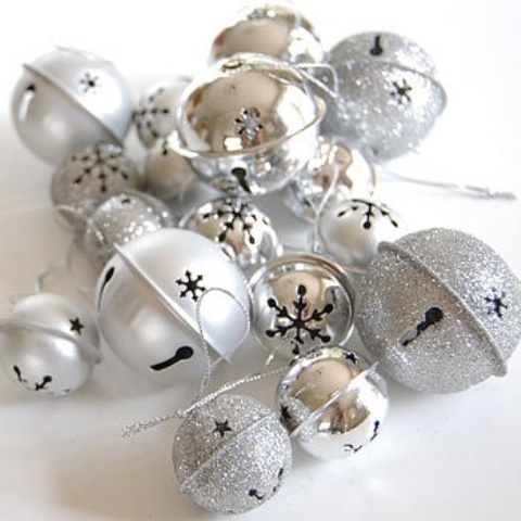 Silver and silver glitter bells can be used throughout your home for Christmas decor   they brilliantly bring the spirit in