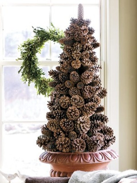 Make a  pinecone's Christmas tree alternative by gluing them together shaped like a spruce tree.
