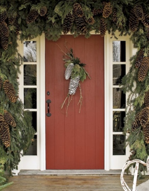 Gigantic pinecones painted with white sparkles could become a door hanger that would welcome your guests during winter.