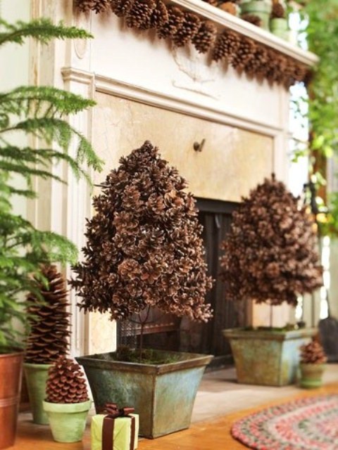 To make a pinecone topiary, cover a large styrofoam ball with a garbage bag. Then, apply to it as many pinecones as you want using a hot-glue gun.