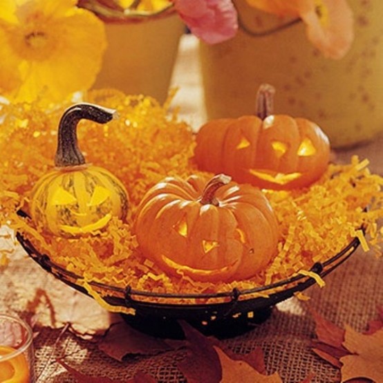 Pumpkin lanterns could delightfully brighten up an evening affair. Works as for Halloween as for a casual Fall dinner.
