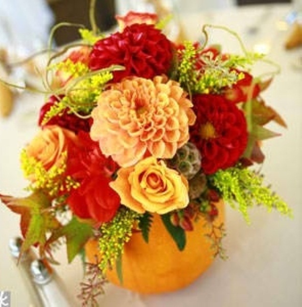 Simply carve a hole in a pumpkin and fill up with your favorite fall blooms.