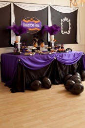 a cool purple halloween table decor