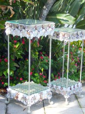 mini glass serving tables clad with seashells look lovely, bold and unexpected and finish any beach home