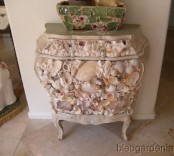 a small vintage refined sideboard fully clad with seashells will give a strong sea feel to your space