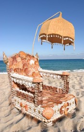 a lounger fully clad with seashells of all kinds looks unique and bold and screams about seas and coasts