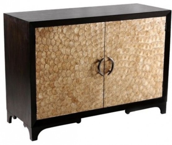 a refined dark stained credenza clad with mother of pearl looks unusual, bold and very cool