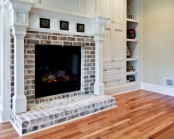 a whitewashed fireplace of dark brick looks not that bold and statement-like but brings coziness and a stylish touch to the space