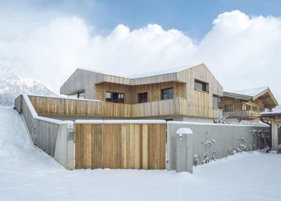 Barn-Like Alpine Cottage With Modern Interiors