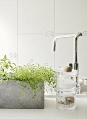 a concrete planter with greenery will be a nice idea for any bathroom, it’s veyr durable and very stylish and will add a contemporary touch to the space