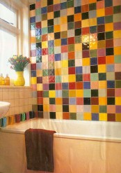 Bathroom With A Wall Tiled In Bunch Of Colors