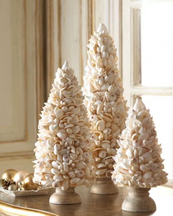 gorgeous Christmas trees composed of seashells and on wooden stands are amazing to style your space for holidays