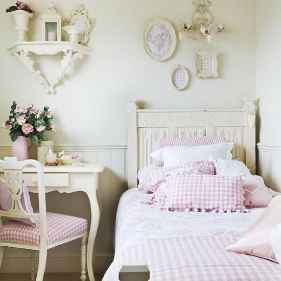 a pretty shabby chic kid's room with pastel walls and furniture, with pink plaid bedding and upholstery is very girlish and cute