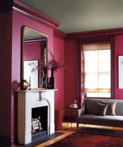 burgundy walls will make your living room extra bright and lively raising the spirits each time you enter
