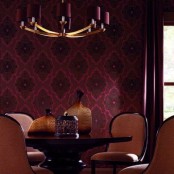 a statement moody wall in burgundy and black is a bold idea to bring fall to your dining room