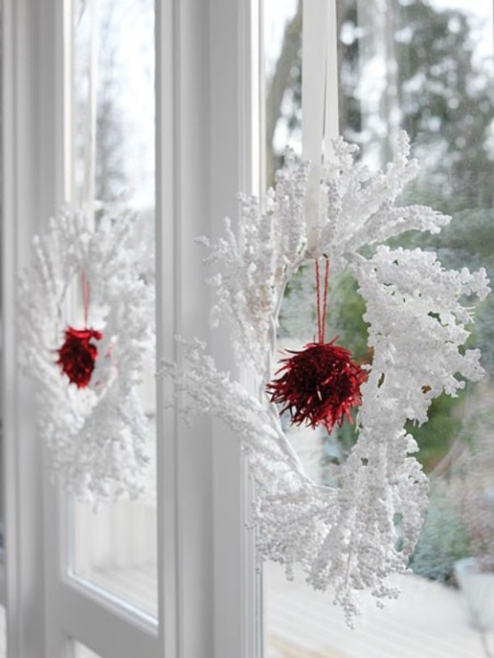 Snowy wreaths are perfect Christmas window decorations.
