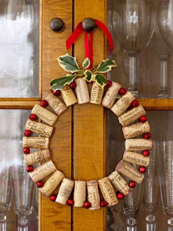 Do you have a home bar or a glassware cabinet? Upcycle old corks to make a cute, little wreath to hang on the cabinet.