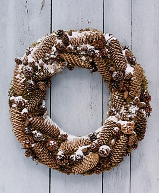 Pinecones is a great material you could use to make a rustic christmas wreath. Add some fake snow to make the wreath to suit winter better.