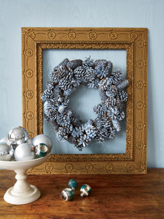 To make a wreath looks rustic find a vintage frame and hang the wreath inside of it.