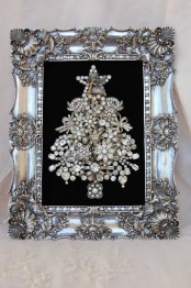 a refined brooch Christmas tree with beads and rhinestones in an embellished silver frame won’t take floor space and will be gorgeous