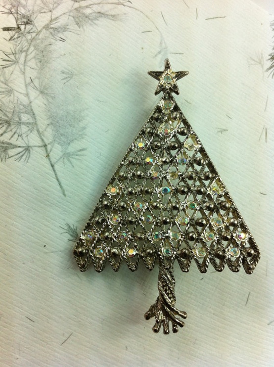 a whimsy vintage Christmas tree of wire and beads is a creative idea to add a refined feel to the space