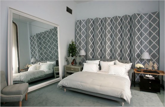 Bedroom With A Large Mirror