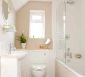 a taupe and white small bathroom looks fresh and doesn’t look that small thanks to the color combo