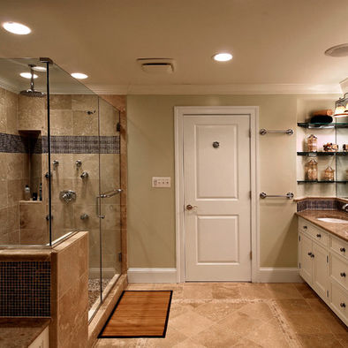 A taupe and beige bathroom with touches of creamy and rich colored wood plus black