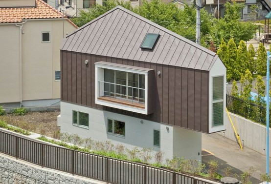Compact Birdhouse-Shaped Minimalist Home