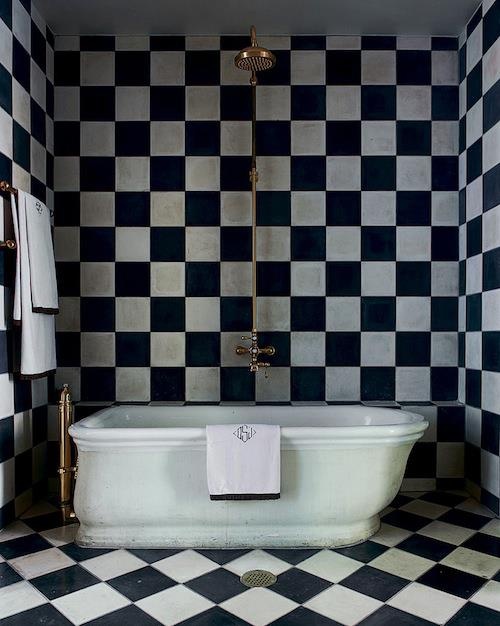 A black and white bathroom could be designed not only in modern but in traditional style too.