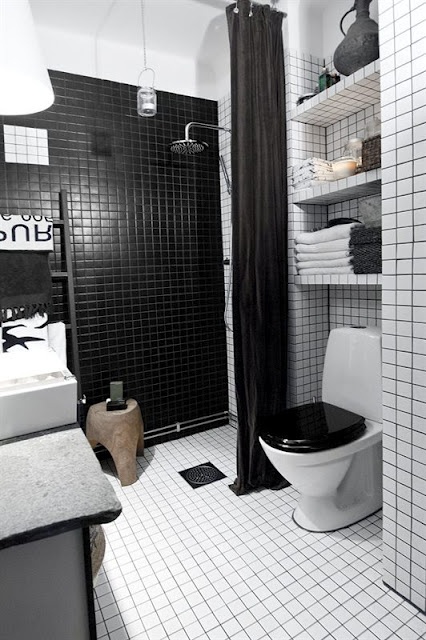 To add some additional contrast you can use  black grout with white tiles. A black toilet seat is also a cool thing to consider.