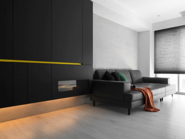 Black andwhite minimalist apartment with pops of yellow  2