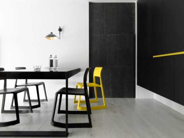 Black andwhite minimalist apartment with pops of yellow  7