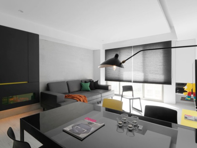 Black andwhite minimalist apartment with pops of yellow  8