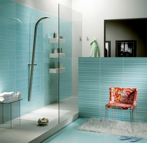 turquoise tiles and floors plus neutral touches for a minimalist and laconic bathroom