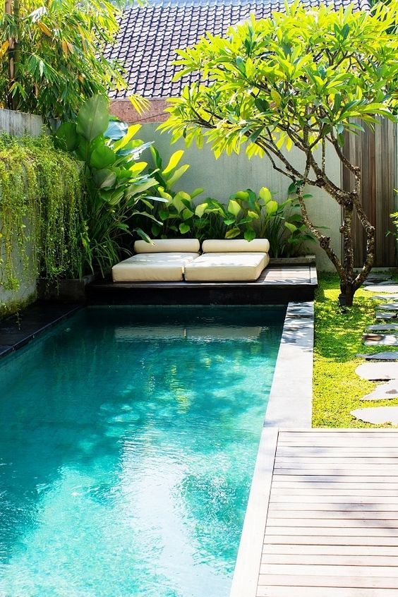 great looking private backyard pool tiles with blue tiles