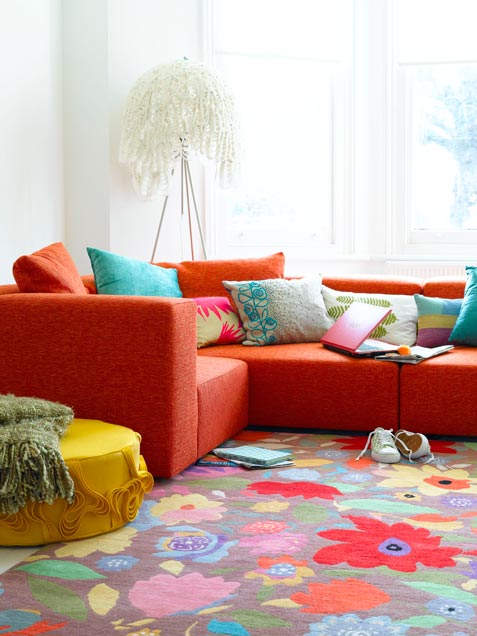 Bright Living Room With Floral Rug