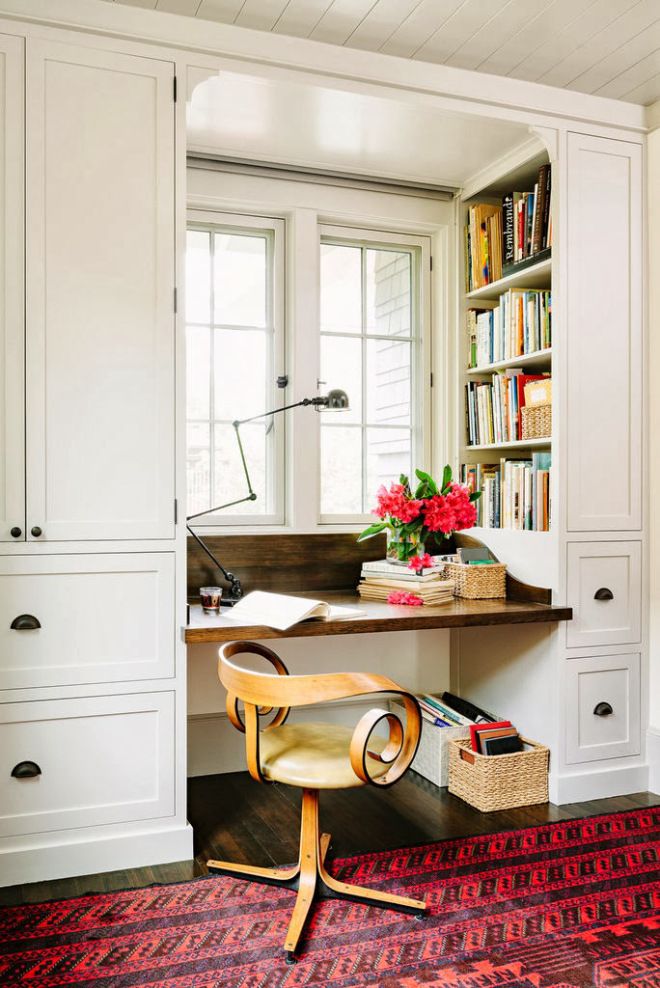 A storage unit with built in shelves on both sides and a built in desk is a very compact piece that can be placed in a small home office or just as a working nook