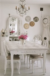 a lovely dining space with a grandfather’s clock