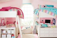 a pink girl’s bedroom design with two bunk beds