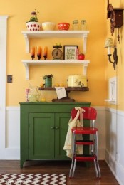 a warm kitchen design in yellow tones