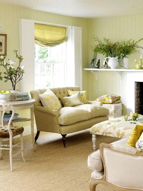 floral print textiles, greenery and blooms in vases for a fresh summer feel in the neutral living room