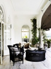 a cool indoor-outdoor space in b&w color scheme