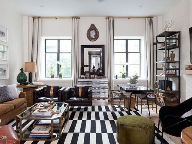 chic glam living room with black and white rug