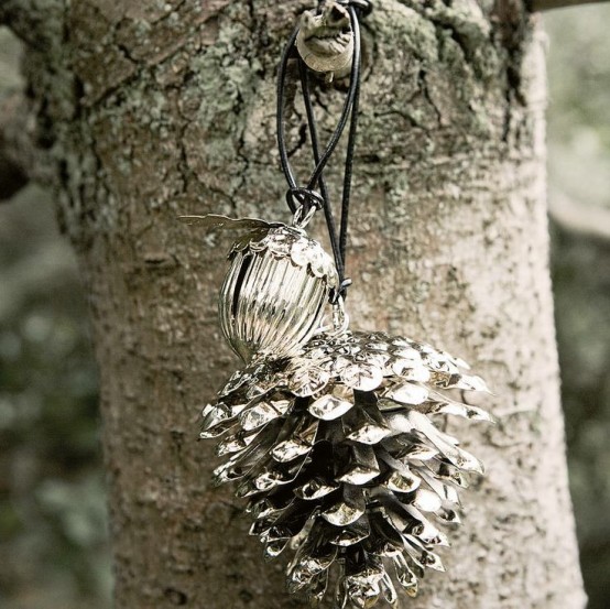 a mercury glass pinecone and an acorn can be used as fall or winter decorations for your home