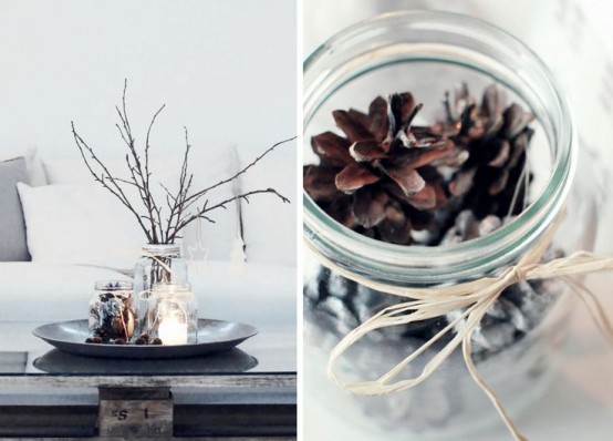 a Nordic fall centerpiece of a tray, pinecones in a jar, branches, candles is a simple and natural idea